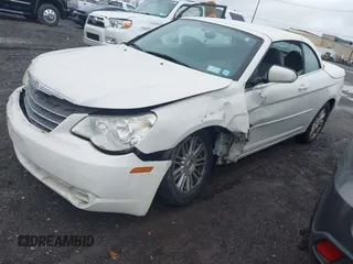 2008 Chrysler Sebring Touring with VIN 1C3LC55R08N260653, listed as a IAAI auction lot 41920159 with 114,543 mi miles and . Bid and sale history available at DreamBid. Image 2.