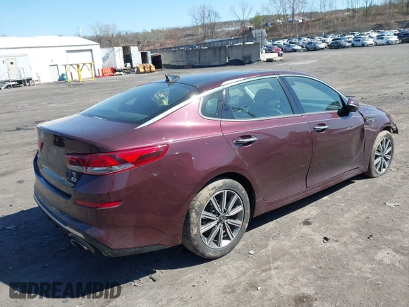2019 Kia Optima EX with VIN 5XXGU4L12KG292041, listed as a IAAI auction lot 42065738 with 74,222 mi miles and . Bid and sale history available at carsss.com. Image 4.