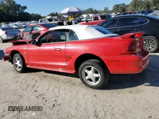 1998 Ford Mustang with VIN 1FAFP4449WF180634, listed as a Copart auction lot 82671504 with 150,195 mi miles and Salvage Title. Bid and sale history available at carsss.com. Image 2.