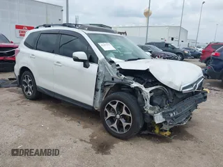 2014 Subaru Forester XT Touring with VIN JF2SJGMC4EH555465, listed as a IAAI auction lot 42357371 with 168,378 mi miles and . Bid and sale history available at DreamBid. Image 1.