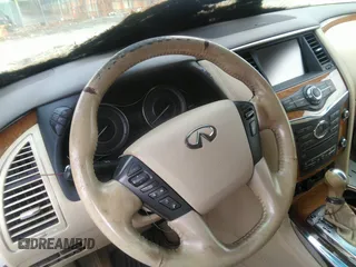 2012 Infiniti QX56 7-passenger z VIN JN8AZ2NE1C9018733, wystawiony jako IAAI lot #42046801 z przebiegiem 186 509 mil mil oraz . Historia ofert i sprzedaży dostępna na DreamBid. Obrazek 6.