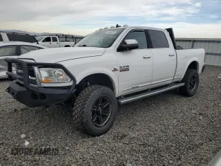 2016 Ram 2500 Laramie Longhorn with VIN 3C6UR5GL2GG173889, listed as a Copart auction lot 84956954 with 128,921 mi miles and Salvage title. Bid and sale history available at DreamBid. Image 1.