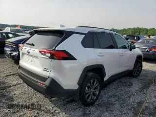 2024 Toyota RAV4 Hybrid XLE Premium with VIN 4T3B6RFV1RU174487, listed as a Copart auction lot 57208645 with 9,911 mi miles and Salvage title. Bid and sale history available at DreamBid. Image 3.