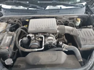 2004 Jeep Grand Cherokee Laredo with VIN 1J4GX48N94C435700, listed as a IAAI auction lot 41809624 with 147,413 mi miles. Bid and sale history available at carsss.com. Image 10.