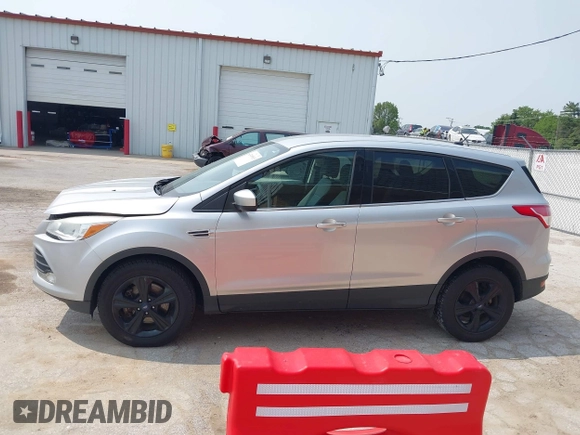 2014 Ford Escape SE with VIN 1FMCU9GX9EUD83148, listed as a IAAI auction lot 42449815 with 120,062 mi miles and . Bid and sale history available at DreamBid. Image 14.