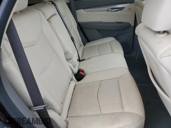2018 Cadillac XT5 Premium Luxury FWD z VIN 1GYKNERS5JZ127703, wystawiony jako Copart lot #58315215 z przebiegiem Nie podano mil oraz Szkoda całkowita • Salvage title. Historia ofert i sprzedaży dostępna na DreamBid. Obrazek 10.