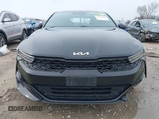 2022 Kia K5 GT-Line z VIN 5XXG64J29NG115786, wystawiony jako IAAI lot #42094520 z przebiegiem 84 234 mil mil oraz . Historia ofert i sprzedaży dostępna na DreamBid. Obrazek 12.