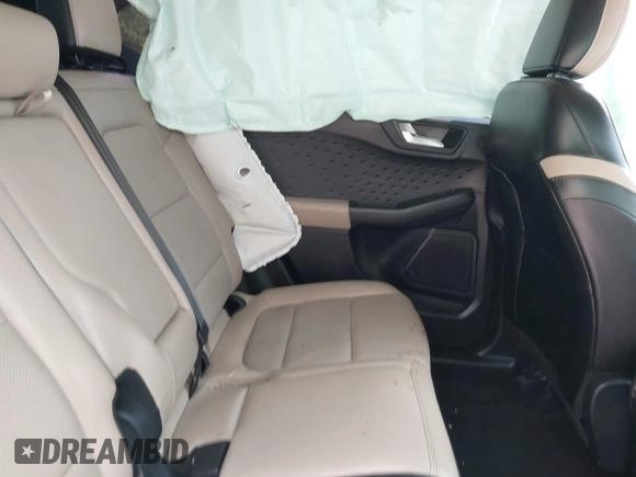 2020 Ford Escape Titanium z VIN 1FMCU9J92LUA39457, wystawiony jako IAAI lot #42222441 z przebiegiem 107 148 mil mil oraz . Historia ofert i sprzedaży dostępna na DreamBid. Obrazek 8.