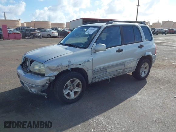 2003 Suzuki Grand Vitara z VIN JS3TE62VX34101622, wystawiony jako IAAI lot #41689760 z przebiegiem 152 104 mil mil oraz . Historia ofert i sprzedaży dostępna na DreamBid. Obrazek 2.