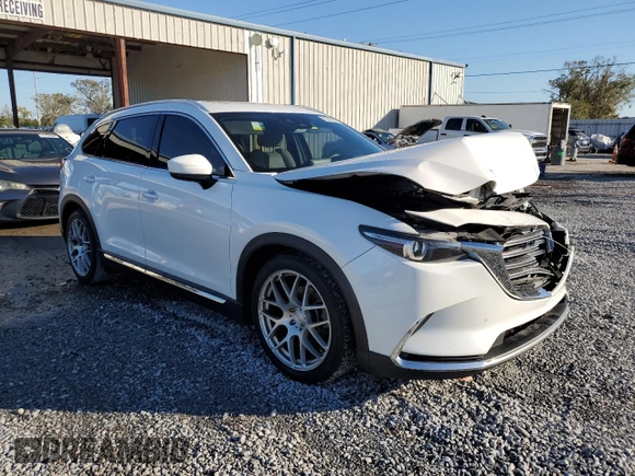2017 Mazda CX-9 Grand Touring z VIN JM3TCADYXH0127867, wystawiony jako Copart lot #82352204 z przebiegiem 129 349 mil mil oraz Szkoda całkowita • Salvage title. Historia ofert i sprzedaży dostępna na DreamBid. Obrazek 4.