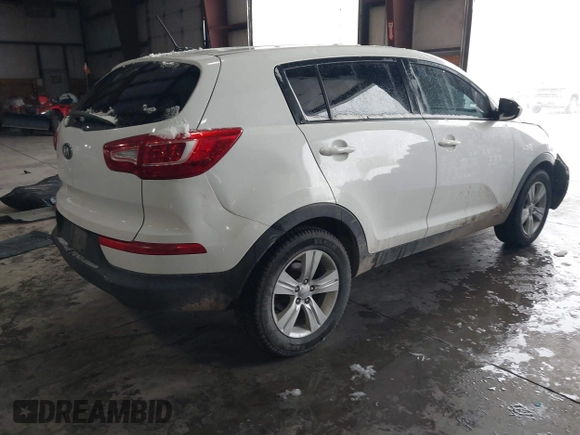 2013 Kia Sportage LX z VIN KNDPBCA28D7356137, wystawiony jako IAAI lot #41577243 z przebiegiem 141 985 mil mil oraz . Historia ofert i sprzedaży dostępna na DreamBid. Obrazek 4.