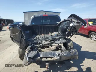 2015 Toyota Tacoma with VIN 3TMMU4FN7FM078006, listed as a Copart auction lot 59129495 with 244,062 mi miles and Salvage title. Bid and sale history available at DreamBid. Image 6.