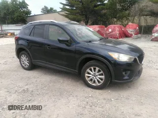 2014 Mazda CX-5 Touring z VIN JM3KE2CYXE0429149, wystawiony jako IAAI lot #42471772 z przebiegiem 222 440 mil mil oraz . Historia ofert i sprzedaży dostępna na DreamBid. Obrazek 1.