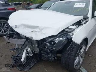 2014 Mercedes-Benz E 350 Luxury with VIN WDDHF8JB8EA980004, listed as a IAAI auction lot 42160745 with 58,418 mi miles and . Bid and sale history available at DreamBid. Image 6.