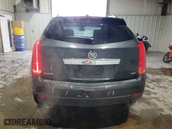 2015 Cadillac SRX z VIN 3GYFNAE34FS523702, wystawiony jako Copart lot #44706065 z przebiegiem 148 259 mil mil oraz Szkoda całkowita • Salvage title. Historia ofert i sprzedaży dostępna na DreamBid. Obrazek 6.