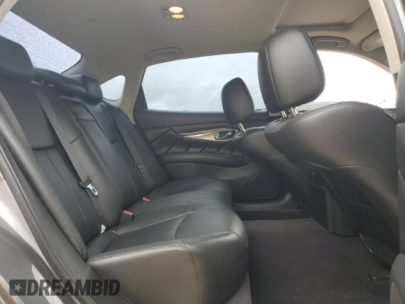 2015 Infiniti Q70 z VIN JN1BY1PR6FM831034, wystawiony jako Copart lot #51889835 z przebiegiem 128 220 mil mil oraz Szkoda całkowita • Salvage title. Historia ofert i sprzedaży dostępna na DreamBid. Obrazek 10.