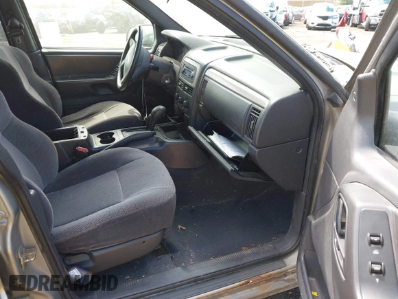 2001 Jeep Grand Cherokee Laredo with VIN 1J4GW48S11C503427, listed as a IAAI auction lot 40004360 with 232,712 mi miles and . Bid and sale history available at DreamBid. Image 5.