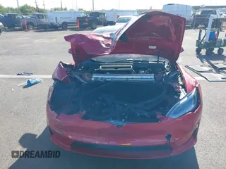 2022 Tesla Model S Plaid with VIN 5YJSA1E61NF460253, listed as a IAAI auction lot 40328727 with Not provided miles and . Bid and sale history available at DreamBid. Image 13.