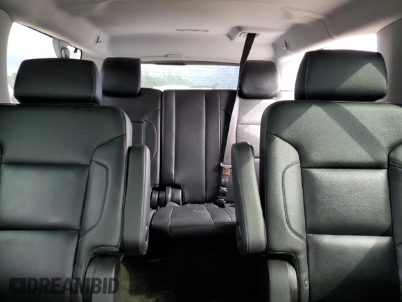 2015 Chevrolet Suburban LT with VIN 1GNSCJKC1FR159411, listed as a Copart auction lot 52169465 with 145,511 mi miles and Salvage title. Bid and sale history available at DreamBid. Image 10.