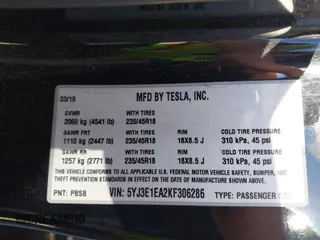 2019 Tesla Model 3 Mid Range with VIN 5YJ3E1EA2KF306286, listed as a IAAI auction lot 41699127 with 56,249 mi miles and . Bid and sale history available at DreamBid. Image 9.