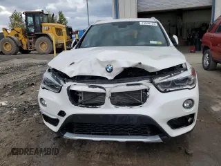 2017 BMW X1 xDrive28i z VIN WBXHT3C35H5F68041, wystawiony jako Copart lot #74858123 z przebiegiem 103 234 mil mil oraz Szkody całkowita. Historia ofert i sprzedaży dostępna na DreamBid. Obrazek 5.