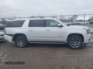 2016 GMC Yukon XL Denali with VIN 1GKS2HKJ9GR264481, listed as a IAAI auction lot 41764272 with 114,852 mi miles. Bid and sale history available at carsss.com. Image 13.