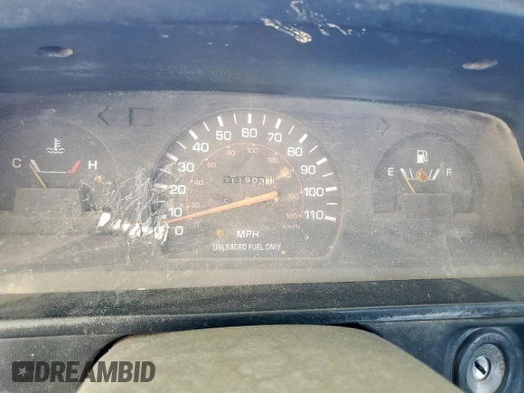 1990 Toyota Pickup DLX z VIN JT4VN13D5L5037936, wystawiony jako Copart lot #57442565 z przebiegiem 311 903 mil mil oraz Czysty tytuł • Clean title. Historia ofert i sprzedaży dostępna na DreamBid. Obrazek 9.