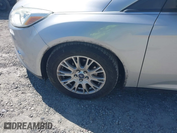 2012 Ford Focus SE with VIN 1FAHP3K27CL333433, listed as a IAAI auction lot 42140452 with 156,048 mi miles and . Bid and sale history available at carsss.com. Image 14.
