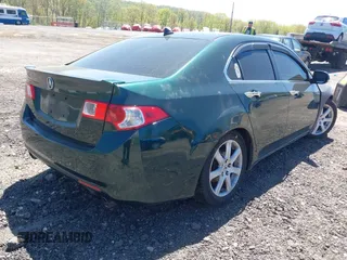 2009 Acura TSX with VIN JH4CU26629C022245, listed as a IAAI auction lot 42154263 with 141,753 mi miles. Bid and sale history available at carsss.com. Image 4.