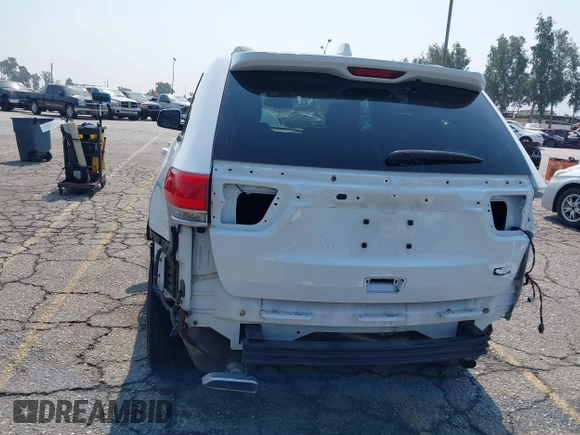 2015 Jeep Grand Cherokee Summit with VIN 1C4RJEJG8FC232253, listed as a IAAI auction lot 42725115 with 133,600 mi miles and . Bid and sale history available at DreamBid. Image 17.