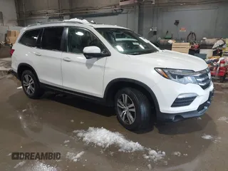 2018 Honda Pilot EX-L with VIN 5FNYF6H5XJB011708, listed as a IAAI auction lot 41527661 with 88,523 mi miles. Bid and sale history available at carsss.com. Image 1.