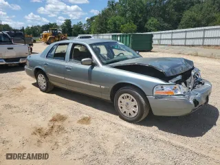 2005 Mercury Grand Marquis GS with VIN 2MEFM74W15X663557, listed as a Copart auction lot 65799904 with 107,483 mi miles and Salvage Title. Bid and sale history available at carsss.com. Image 4.