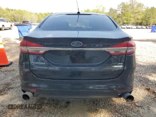 2017 Ford Fusion SE z VIN 3FA6P0H98HR328552, wystawiony jako Copart lot #52709395 z przebiegiem 188 451 mil mil oraz Szkoda całkowita • Salvage title. Historia ofert i sprzedaży dostępna na DreamBid. Obrazek 6.