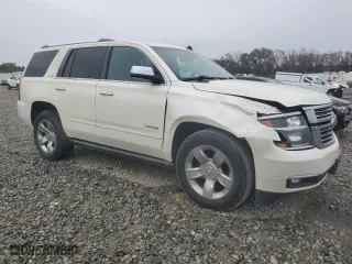 2015 Chevrolet Tahoe LTZ with VIN 1GNSKCKC2FR126674, listed as a Copart auction lot 83836704 with 0 mi miles and Salvage Title. Bid and sale history available at carsss.com. Image 4.