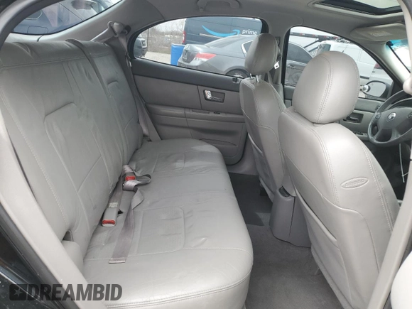 2003 Mercury Sable LS Premium with VIN 1MEHM59S83A615711, listed as a Copart auction lot 49820525 with 108,594 mi miles and Salvage Title. Bid and sale history available at DreamBid. Image 11.