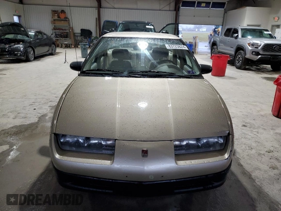 1995 Saturn SL with VIN 1G8ZK5271SZ238117, listed as a Copart auction lot 83723624 with 80,535 mi miles and Clean title. Bid and sale history available at DreamBid. Image 5.