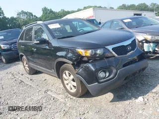 2013 Kia Sorento LX with VIN 5XYKTDA60DG375459, listed as a IAAI auction lot 42411602 with 157,802 mi miles and . Bid and sale history available at DreamBid. Image 1.