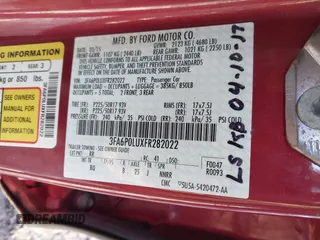 2015 Ford Fusion SE Hybrid with VIN 3FA6P0LUXFR282022, listed as a IAAI auction lot 41652820 with 210,865 mi miles. Bid and sale history available at carsss.com. Image 9.