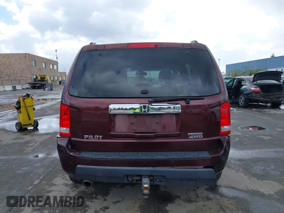 2009 Honda Pilot Touring with VIN 5FNYF48959B007813, listed as a IAAI auction lot 41823645 with 200,571 mi miles and . Bid and sale history available at carsss.com. Image 16.