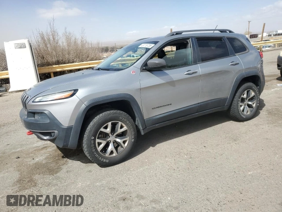 2015 Jeep Cherokee Trailhawk with VIN 1C4PJMBS3FW787033, listed as a Copart auction lot 49176735 with 83,013 mi miles and Salvage Title. Bid and sale history available at carsss.com. Image 1.