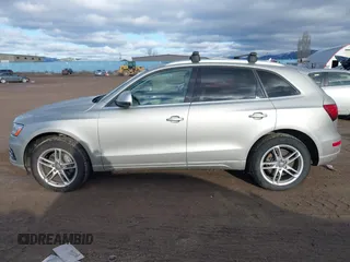2014 Audi Q5 Premium Plus with VIN WA1CMAFP6EA063529, listed as a IAAI auction lot 41705364 with 154,501 mi miles and . Bid and sale history available at DreamBid. Image 15.