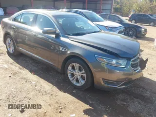 2015 Ford Taurus SEL z VIN 1FAHP2E85FG134887, wystawiony jako IAAI lot #40904210 z przebiegiem 156 925 mil mil oraz . Historia ofert i sprzedaży dostępna na DreamBid. Obrazek 1.