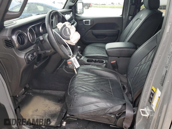 2023 Jeep Wrangler Sport Altitude with VIN 1C4HJXDG1PW679641, listed as a Copart auction lot 50371475 with 18,546 mi miles and Salvage Title. Bid and sale history available at DreamBid. Image 7.