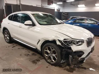 2020 BMW X4 xDrive30i with VIN 5UX2V1C08LLE68011, listed as a IAAI auction lot 41389958 with 119,391 mi miles. Bid and sale history available at carsss.com. Image 1.
