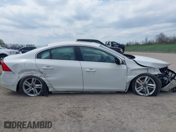 2014 Volvo S60 T5 z VIN YV1612FH8E1292976, wystawiony jako IAAI lot #42129708 z przebiegiem 162 083 mil mil oraz . Historia ofert i sprzedaży dostępna na DreamBid. Obrazek 14.