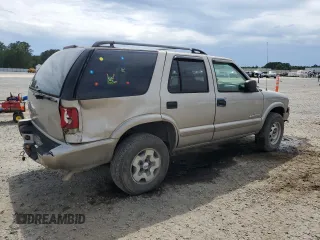 2004 Chevrolet Blazer LS z VIN 1GNDT13X24K145775, wystawiony jako Copart lot #56202555 z przebiegiem 224 339 mil mil oraz Szkoda całkowita • Salvage title. Historia ofert i sprzedaży dostępna na DreamBid. Obrazek 3.