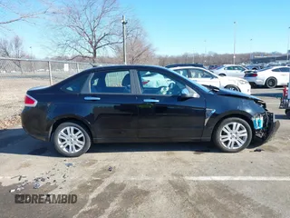 2009 Ford Focus SEL with VIN 1FAHP37N49W211350, listed as a IAAI auction lot 41641517 with 59,409 mi miles. Bid and sale history available at carsss.com. Image 14.