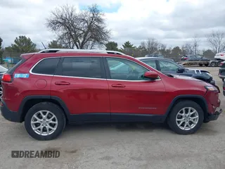 2015 Jeep Cherokee North with VIN 1C4PJMCS9FW674475, listed as a IAAI auction lot 41971771 with 186,376 mi miles. Bid and sale history available at carsss.com. Image 12.