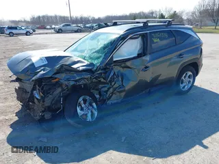 2022 Hyundai Tucson SEL with VIN 5NMJBCAE5NH137470, listed as a IAAI auction lot 41868573 with 28,034 mi miles and . Bid and sale history available at carsss.com. Image 2.