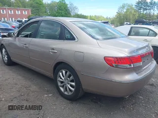 2006 Hyundai Azera SE with VIN KMHFC46FX6A125848, listed as a IAAI auction lot 42195041 with 147,596 mi miles and . Bid and sale history available at DreamBid. Image 3.